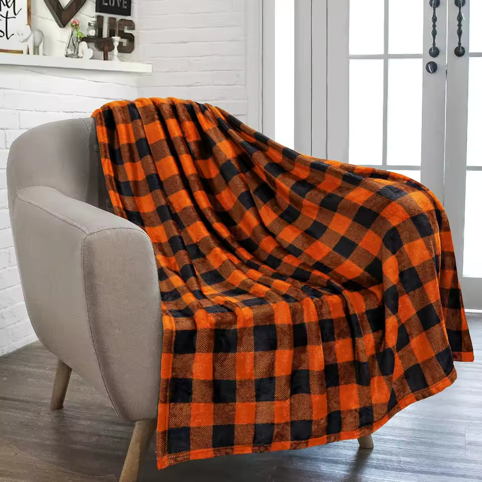 Orange and black large check tartan throw